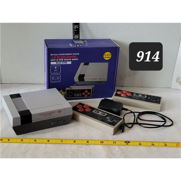 Nintendo 2.4 Wireless game pad. 620, 8 bit games, complete.