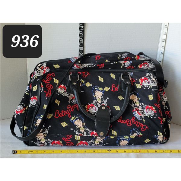 Very nice Betty Boop travel bag. Zipper pockets, handles & clip on shoulder strap.