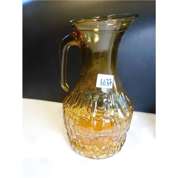 1037.  MCM AMBER TEXTURED PITCHER