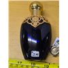 Image 2 : Perfume theme bracelet and avon mesmerize bottle