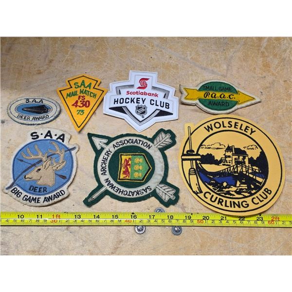 lot of vintage sport patches and badges