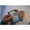 Image 3 : 4 tins of pokemon cards