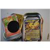 Image 2 : 4 tins of pokemon cards