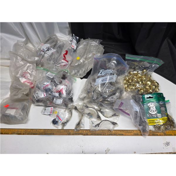 Lot of door knobs and hardware