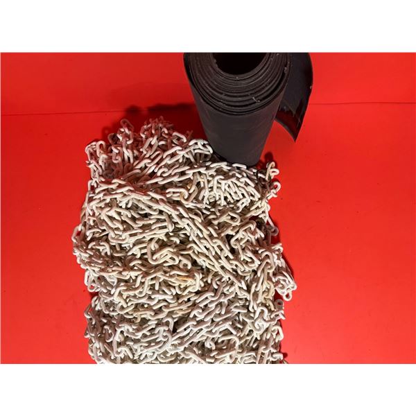 Large quantity of white plastic barrier chain and a roll of waterproof membrane