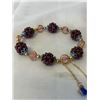 Image 2 : GOLD ENAMEL W/ GENUINE GARNET STONE BEADED BRACELET WITH TASSELS