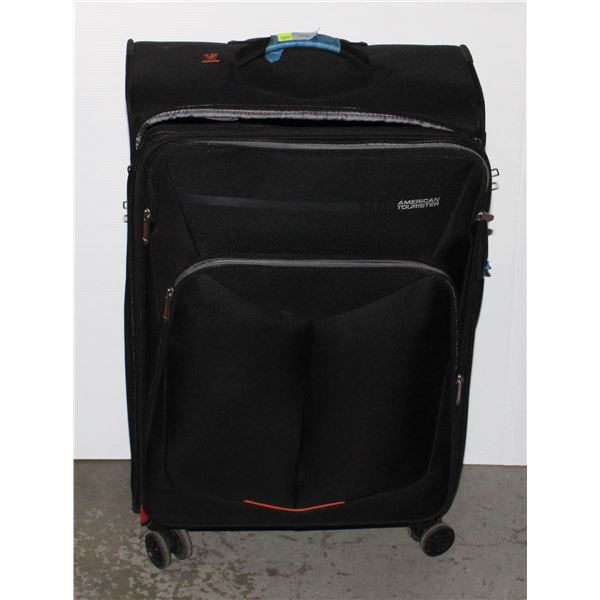 AMERICAN TOURISTER SUIT CASE ON WHEELS