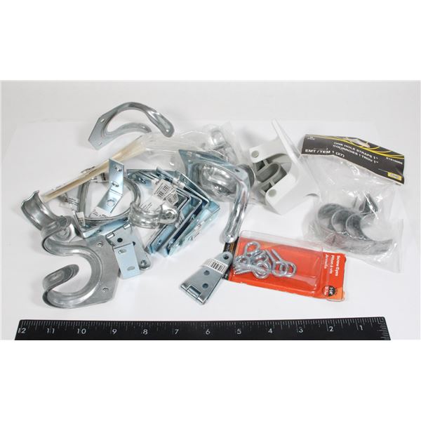 LOT OF ASSORTED CLAMPS AND BRACKETS