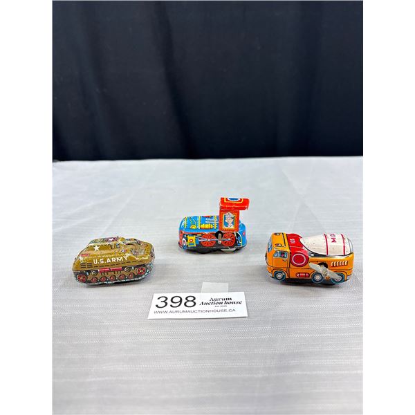 Lot of 3 vintage small tin toys