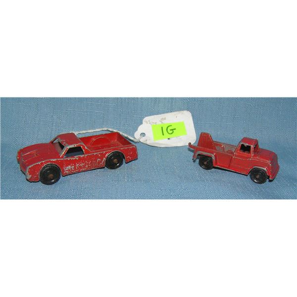 Pair of early cast metal midgit toy trucks