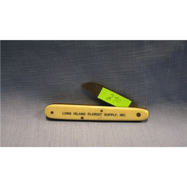 Antique celluloid advertising pocket knife