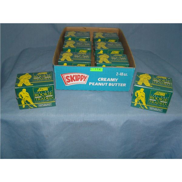 Box full of Score hockey rookie and traded card sets