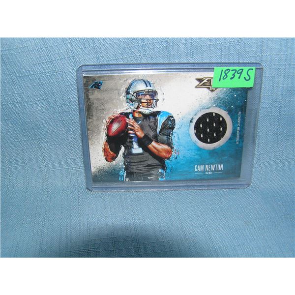 Cam Newton rookie football card with game used material insert