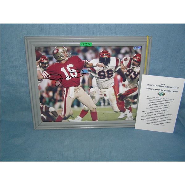 Autographed Joe Montana 8 by 10 color photo with certificae of authenticity