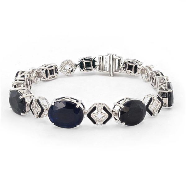 29.31 ctw Blue Sapphire and 0.25 ctw Diaond 18K White Gold Bracelet with Black E
