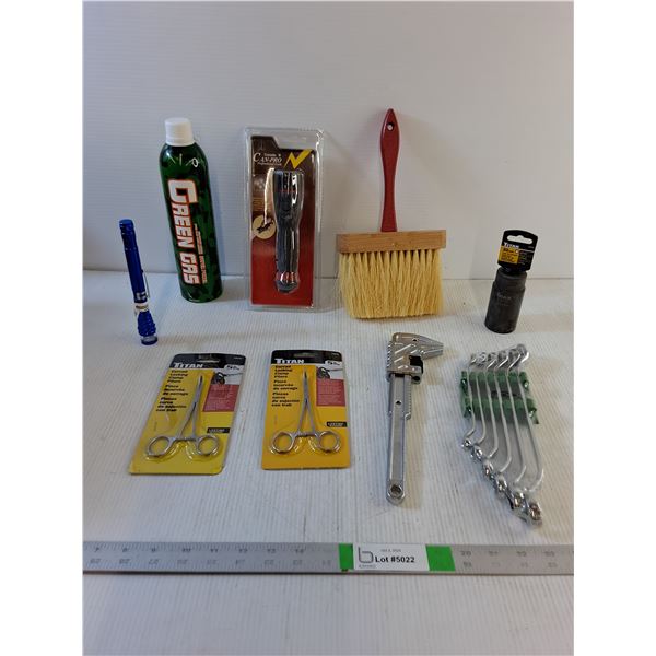 Green Gas, (2) Flashlights, Utility Brush, (2) Curved Locking Clamp Pliers, Wrenches, Axle Nut Sock