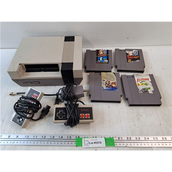 Nintendo Gaming Console, Joysticks, (4) Game Cartridges  - As Is, Authenticity Not Guaranteed