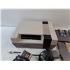 Image 2 : Nintendo Gaming Console, Joysticks, (4) Game Cartridges  - As Is, Authenticity Not Guaranteed