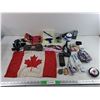 Image 1 : Piercing Gun, Precision Tool Kit, Canadian Flag, Jewelry, Sunglasses, Pointed Pellets, Misc