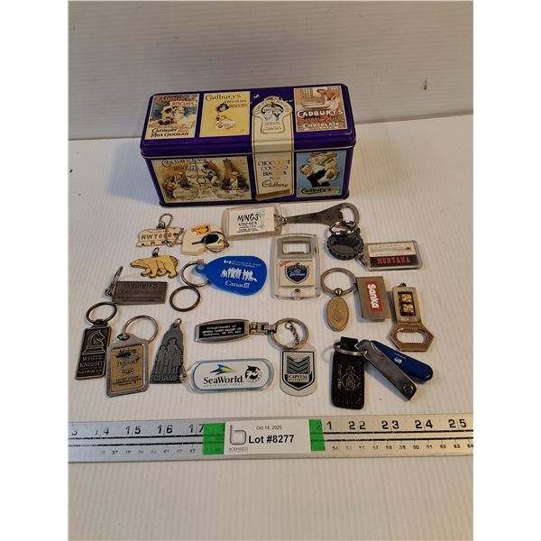 (20) Assorted Keychains and Bottle Openers with Cadbury Tin
