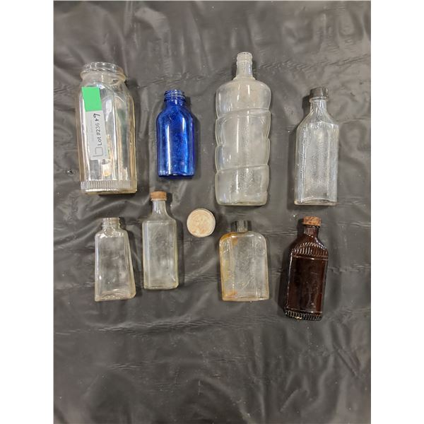 Variety of Vintage Glass Bottles
