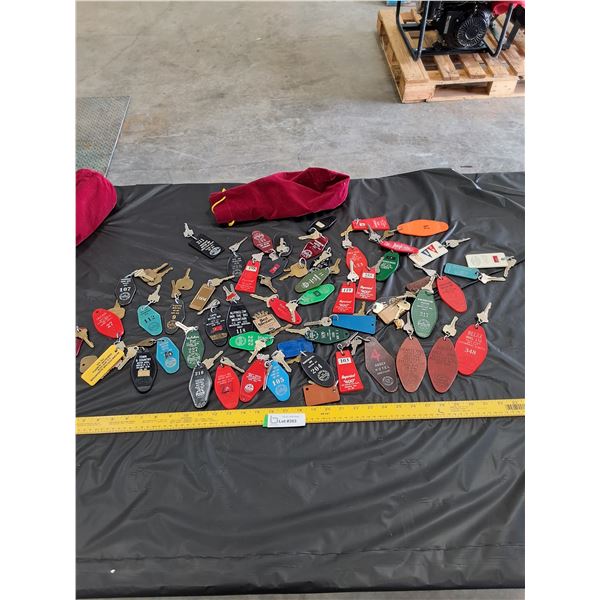 Collection of Hotel Keychains in Bag