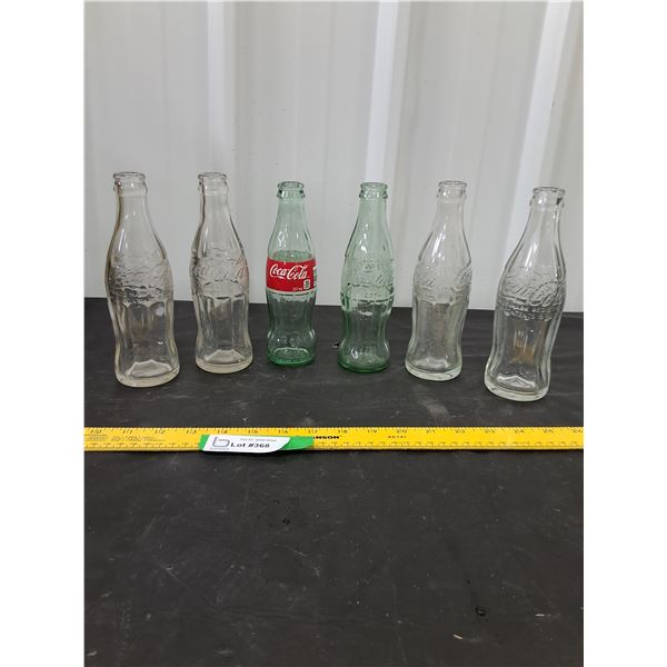 (6) Coca-Cola Bottles