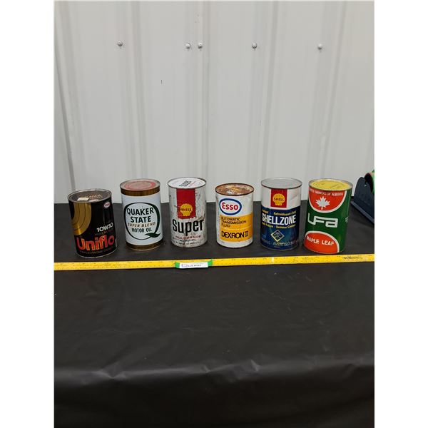 (2) 1 liter cans, (4) 1 quart cans Oil, Antifreeze, Transmission Fluid, all full