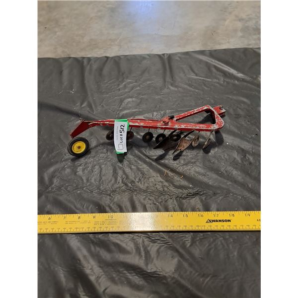 Tin Plow Toy