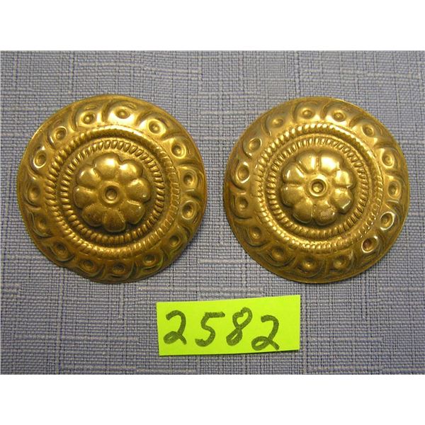 Pair of early punched brass clip on earrings