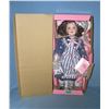 Image 1 : Porcelain doll with fancy dress and hat
