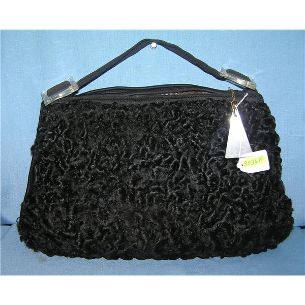 Lamb's wool pocket book with clear lucite strap