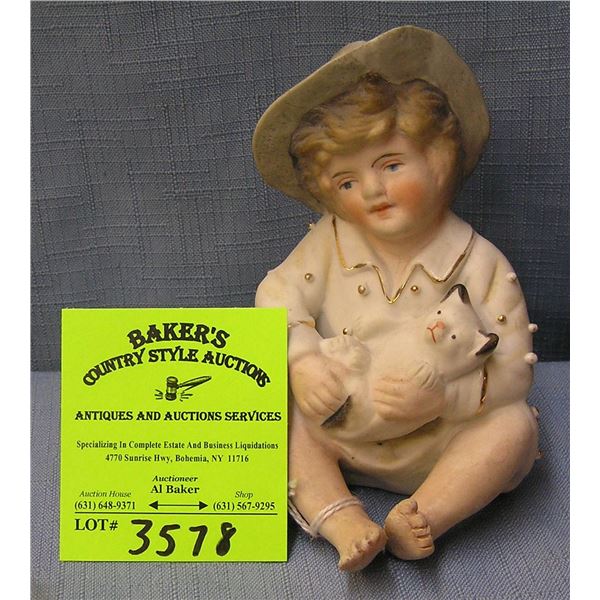 Vintage bisque piano baby doll with cat