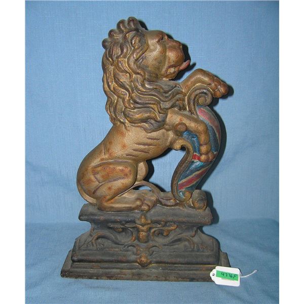 Hand painted cast iron heraldic lion door stop