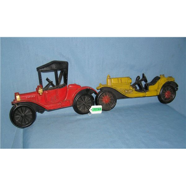 Pair of painted cast metal wall plaques