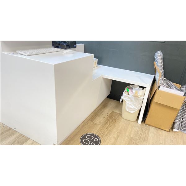 WHITE MODERN L-SHAPED COMMERCIAL CHECKOUT STAND APPROX 56"W X 49.2"D X 40"H