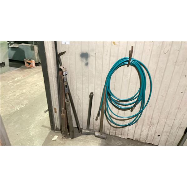SHORING TOOLS LOCATED IN FRONT CORNER OF ROOM