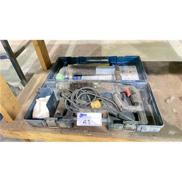 BOSCH BULLDOG XTREME DEMOLITION DRILL IN HARD TRANSPORT CASE WITH ATTACHMENT