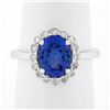 14k White Gold 2.60 ctw Violet Blue Oval Tanzanite w/ Round Diamond Halo Ring