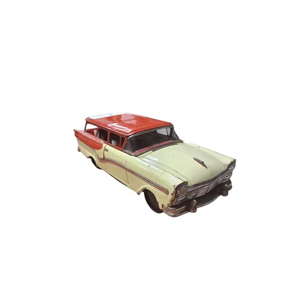 Vintage Ford station wagon friction toy, works, Mad in Japan, approx 11.5"