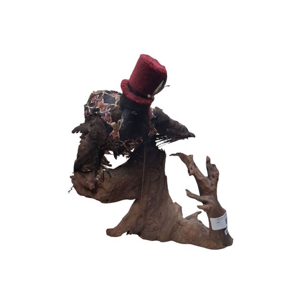 Taxidermied crow mounted on wood 14" tall