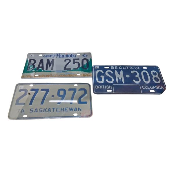 3 license plates, 76 Sask, BC, Man