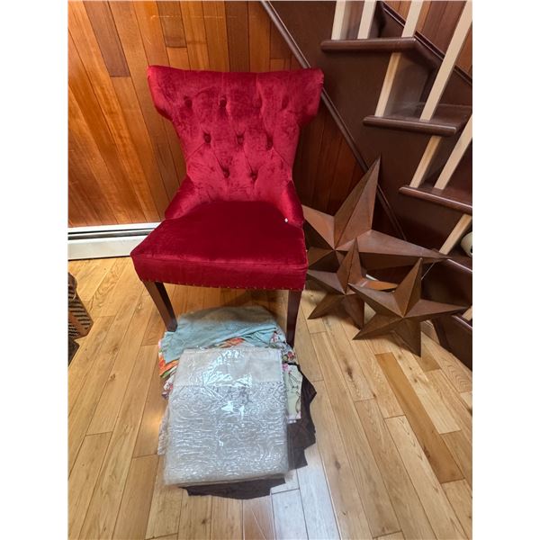Red Velvet Button Back Sitting Chair, Table Linens and Decorative Star Wall Art