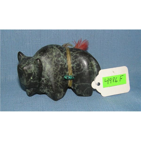 Bronze Southwest style buffalo with turquoise and feather decoration