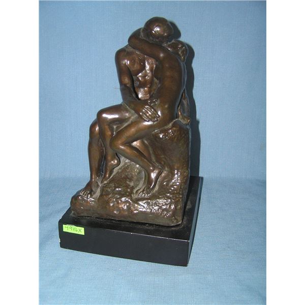 Modern bronze colored ceramic lovers figure