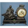 Image 1 : Bronzed over cast metal mantle clock with Cincinnatus figure
