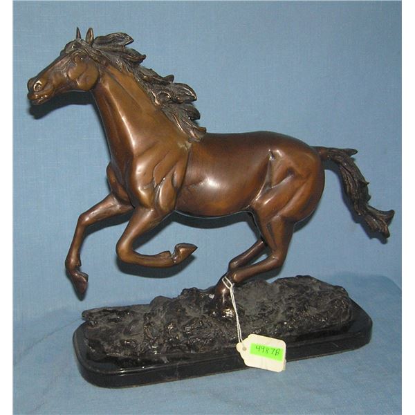 Prancing horse bronze with black enamel on base