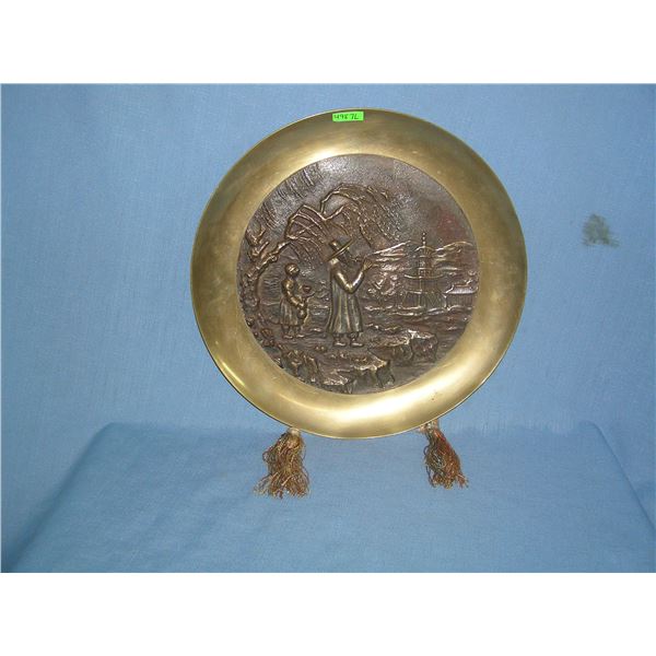 Antique solid bronze wall charger