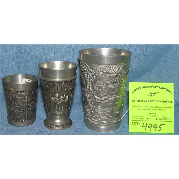 Group of three vintage souvenir pewter drink cups