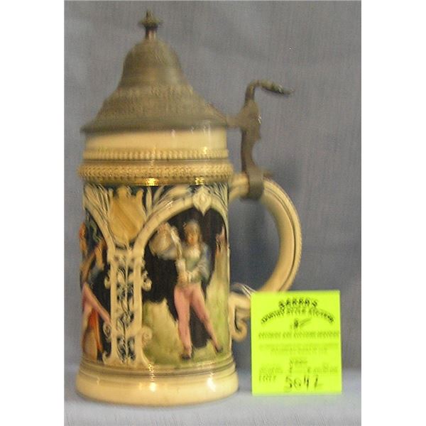 Vintage German beer stein with pewter lid